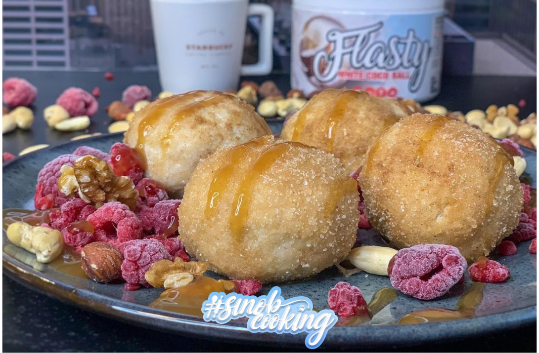 Marzipan-Topfenknödel mit Himbeerfüllung